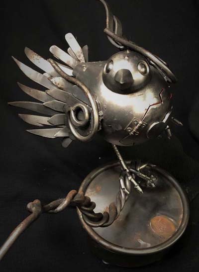 well known NYC Artist DE Nadie metal sculptures