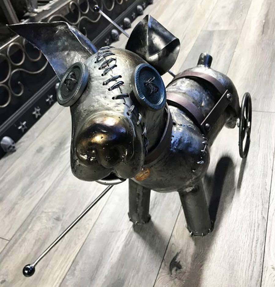 voodoo doll metal sculpturer hadicap dog  done by De Nadie 